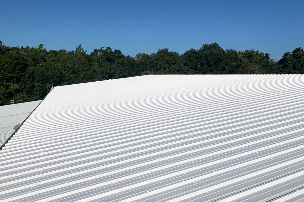 Overhead Construction and Roofing's Spray Polyurethane Foam metal and flat roof waterproofing solutions provides a seamless application to ensure a leak free metal or flat roof for commercial and residential applications within the Twin Cities metro area.